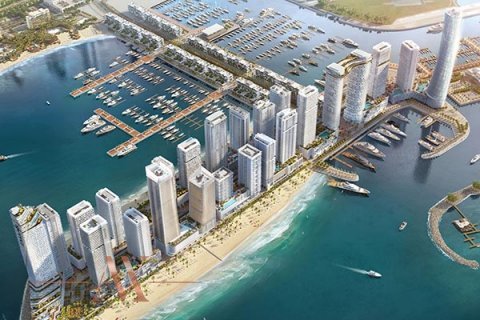 What kind of real estate by the sea does Emaar offer for purchase?